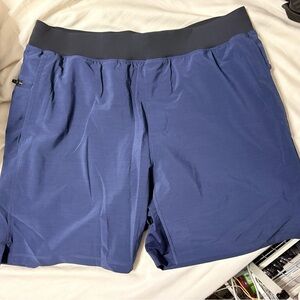 Fabletics Men's Performance Lined Athletic Shorts - Navy Blue 7”